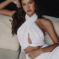 Isabelle Mathers wearing a white halter top with a cutout design bella top by Kukhareva London
