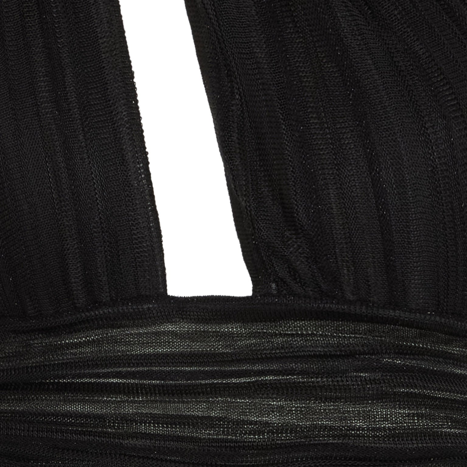 Close-up of black ribbed fabric with a white background