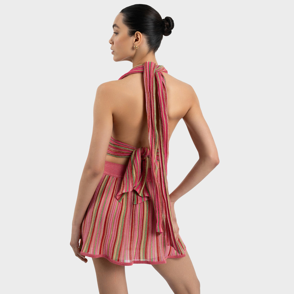 backview model wearing  red green multistriped halter top with open back and mini skirt. Bella Top and Storm Mini Skirt by Kukhareva London