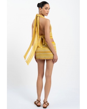 model back view of the Bella halterneck top in sunshine butter yellow